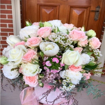 Pastel pink arrangement with pink and white roses and white tulips