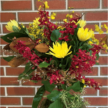Bright bunch of yellow and red flowers.