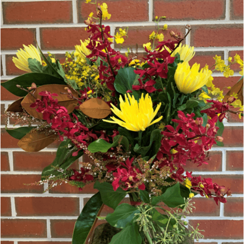 Bright bunch of yellow and red flowers.