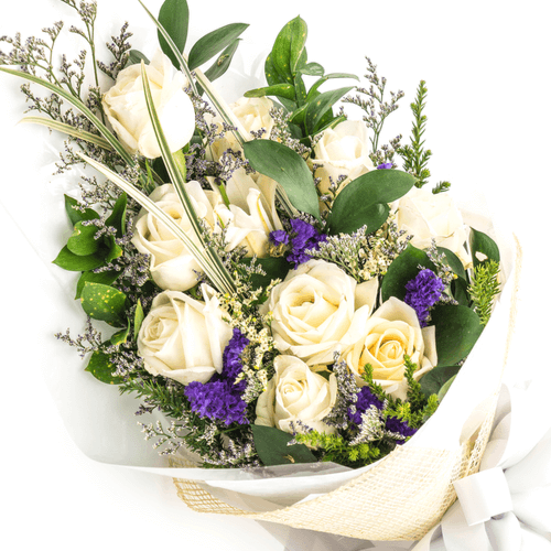 white roses funeral sheaf.