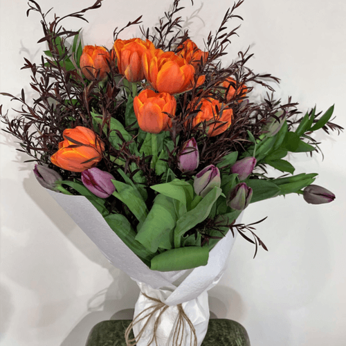 close picture of pink and orange tulips bouquet