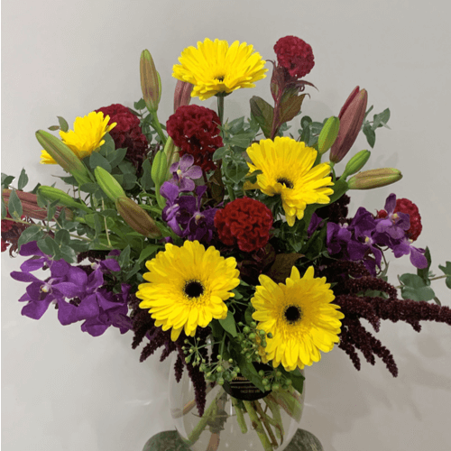 Bright bunch of yellow and red flowers.